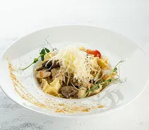 Мафальдине с куриным филе и грибами в сливочном соусе